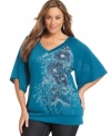 Look pretty in petals with Style&co.'s three-quarter-sleeve plus size top, finished by a banded hem. (Clearance)