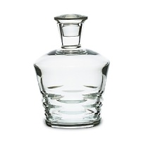 Horizontal, leaf-like cuts dance across the bowls of this captivating decanter from Baccarat. Horizontal, leaf-like cuts dance across the bowls of this captivating decanter from Baccarat.