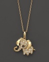 Diamond elephant pendant necklace in yellow gold.
