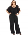 Get set to party in Spense's plus size jumpsuit, cinched by a smocked waist!