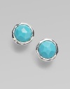 A simply chic style in sleek sterling silver with rich, faceted turquoise stones. Sterling silverTurquoiseSize, about ½Post backImported 