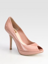 Step up in this classic silhouette of classic patent leather from Italy.Self-covered heel, 3¼ (80mm) Platform, ½ (15mm) Compares to a 2¾ heel (70mm) Peep toe Leather lining and sole Padded insole Made in ItalyOUR FIT MODEL RECOMMENDS ordering one size up as this style runs small. Step up in this classic silhouette of classic patent leather from Italy.Self-covered heel, 3¼ (80mm) Platform, ½ (15mm) Compares to a 2¾ heel (70mm) Peep toe Leather lining and sole Padded insole Made in ItalyOUR FIT MODEL RECOMMENDS ordering one size up as this style runs small.