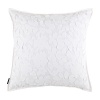 Fanciful floral appliqués, tulle and smooth cotton sateen distinguish this pure white pillow with an impressionistic textural contrast to the linear pleats of the Belgravia duvet set. Edges trimmed in white flat piping. Reverses to solid white cotton sateen.
