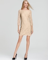 Crafted in romantic lace, this DIANE von FURSTENBERG dress is the epitome of elegance, with a classic boatneck and sheer sleeves. Crafted in romantic lace, this DIANE von FURSTENBERG dress is the epitome of elegance, with a classic boatneck and sheer sleeves.