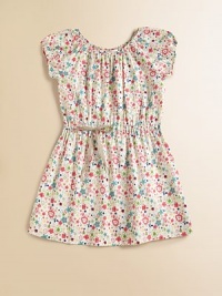 A bright and fun floral print with easy peasant styling on pure cotton.Elasticized gathered necklineCap raglan sleeves with elasticized openings/li> Drawstring waist with ribbon tiesPullover stylingCottonMachine washImported A bright and fun floral print with easy peasant styling on pure cotton.Elasticized gathered necklineCap raglan sleeves with elasticized openings/li> Drawstring waist with ribbon tiesPullover stylingCottonMachine washImported