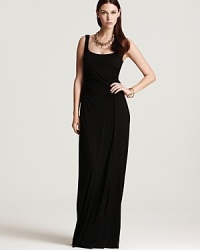 A Theory maxi dress with ruching at the sides flaunts the contours of your silhouette for a most alluring look for drinks or dinner with the girls. A Theory maxi dress with ruching at the sides flaunts the contours of your silhouette for a most alluring look for drinks or dinner with the girls.