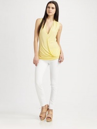 Featherweight jersey draped beautifully from shoulder to hem in a mock-wrap silhouette.V necklineSleevelessMock-wrap frontPullover styleAbout 29 from shoulder to hem94% rayon/6% spandexDry cleanMade in USAModel shown is 5'9 (175cm) wearing US size Small. Featherweight jersey draped beautifully from shoulder to hem in a mock-wrap silhouette.V necklineSleevelessMock-wrap frontPullover styleAbout 29 from shoulder to hem94% rayon/6% spandexDry cleanMade in USAModel shown is 5'9 (175cm) wearing US size Small.