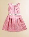 Lovely lace, printed on shiny satin charmeuse, has pretty pleats to make the shape and sparkly jewels at the waist.Round neckline with radiating pleatsSleevelessBack zip closeRibbon waistband with rhinestone accentsRelease pleats at waist ease into full skirtFully lined in satinPolyesterMachine washImported