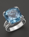Vibrant blue topaz glows from within a diamond-detailed setting. From Di MODOLO.