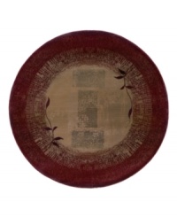 A larger-diameter round ideal for open spaces. This rug features a striking design of two vines in silhouette against a ground of rectangles framed with borders. Hues of sage green, gold, beige and russet blend into each other with striations and stain-like effects to impart a weathered, timeworn feel. A larger-diameter round ideal for open spaces. This rug features a striking design of two vines in silhouette against a ground of rectangles framed with borders. Hues of sage green, gold, beige and russet blend into each other with striations and stain-like effects to impart a weathered, timeworn feel.