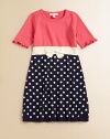 Polka dots and a charming bow breathe new life into this charming knit frock.ScoopneckShort sleeves with ruffled cuffsPullover styleWaistband with bow detailCottonMachine washImported