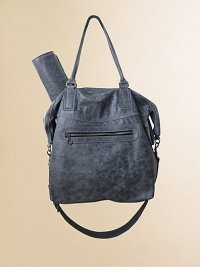 A perfect little carryall for life on the go with baby, in stylishly distressed leather in slouchy silhouette with top zip closure, detachable shoulder strap, stroller clips, matching changing pad and plenty of convenient pockets.Double top handles, 9.5 dropTop zip closureDetachable A perfect little carryall for life on the go with baby, in stylishly distressed leather in slouchy silhouette with top zip closure, detachable shoulder strap, stroller clips, matching changing pad and plenty of convenient pockets.Double top handles, 9.5 dropTop zip closureDetachable