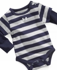 Suit him up in sporty striped with this cute Under Armour bodysuit. Suit him up in sporty striped with this cute Under Armour bodysuit.