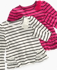 Not her brother's basic: So Jenni designs a striped tee that comes with its own corsage and side flounces to accent its flared silhouette. Not her brother's basic: So Jenni designs a striped tee that comes with its own corsage and side flounces to accent its flared silhouette.