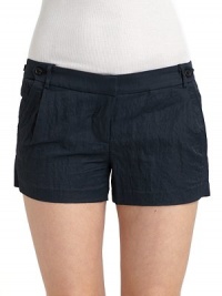 Crinkle-texture adds subtle shine to these trimly tailored shorts. Button-tab details at waist Belt loops Zipper front fly Side slash pockets Back button-flap pockets Back notched waistband Rise, about 2 Inseam, about 9½ 66% nylon/34% cotton; dry clean Imported