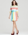 Sherbet-inspired hues brighten up this whimsical striped Alice + Olivia day dress.