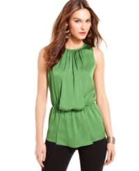 Dress up your work wardrobe with a silky sleeveless top from Vince Camuto. The elegant draped front and blouson effect look polished in the office and keep you looking chic for a night out. Dress up your work wardrobe with a silky sleeveless top from Vince Camuto. The elegant draped front and blouson effect look polished in the office and keep you looking chic for a night out.