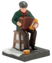 An accordion player makes everything that much merrier, playing for patrons of Murphy's Irish Pub. It's all part of the fun from the Department 56 Christmas in the City collection. An accordion player makes everything that much merrier, playing for patrons of Murphy's Irish Pub. It's all part of the fun from the Department 56 Christmas in the City collection.