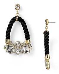 Crystal stones dress up a twisted cord on these drop earrings from nOir. Equal parts crafty and cool, this pair instantly adds some summer-perfect sparkle. Crystal stones dress up a twisted cord on these drop earrings from nOir. Equal parts crafty and cool, this pair instantly adds some summer-perfect sparkle.
