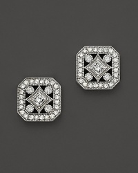 Diamonds set in 14K. white gold recall glamorous art deco style.