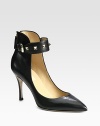 Head-turning leather silhouette with a classic point toe, adjustable ankle strap and gleaming metal studs. Self-covered heel, 3½ (90mm)Leather upper with metal studs on adjustable buckle strapPoint toeBack zipLeather lining and solePadded insoleMade in ItalyOUR FIT MODEL RECOMMENDS ordering true size. 