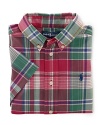 A tried-and-true button-front design is rendered in a vibrant madras plaid.