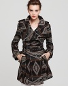 Embrace the exotic with a tribal-print Sam Edelman wrap coat and make it a trend-right fall. Epaulets and textured metal buttons finish the look with edge.