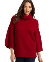 THE LOOKCozy, textured knit constructionCowlneckDraped, three-quarter length dolman sleevesTHE FITAbout 25 from shoulder to hemTHE MATERIALWool/nylonCARE & ORIGINHand washImportedModel shown is 5'9½ (176cm) wearing US size Small. 