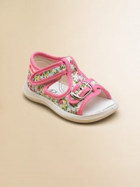 Vibrant flowers and contrasting trim adorn these sweet little t-strap sandals for baby.Adjustable buckle and grip-tape closureCanvas upperCanvas liningRubber solePadded insoleImported Vibrant flowers and contrasting trim adorn these sweet little t-strap sandals for baby.Adjustable buckle and grip-tape closureCanvas upperCanvas liningRubber solePadded insoleImported