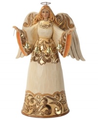 Full of great joy, this angel welcomes the Christmas spirit into your home. While striking gold and cream hues dance across her robe & wings, her calm expression & peaceful countenance create an undeniable warmth. Full of great joy, this angel welcomes the Christmas spirit into your home. While striking gold and cream hues dance across her robe & wings, her calm expression & peaceful countenance create an undeniable warmth.