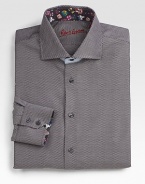 A fresh spin on a sartorial standard, dobby-woven in pure cotton with a hint of personality inside the collar and cuffs. Buttonfront Spread collar Cotton Machine wash Imported 