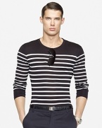 Tailored in a trim-fitting silhouette, a striped long-sleeved crewneck tee embodies effortless style in fine-ribbed, mercerized cotton.