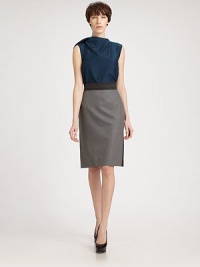 Luxurious silk/wool crepe, tailored in a chic, sleeveless silhouette accented with a soft, modern shoulder drape.High neckline with draped back panelSleevelessAbout 23 from shoulder to hem61% silk/39% woolDry cleanMade in FranceModel shown is 5'10 (177cm) wearing US size 4. Luxurious silk/wool crepe, tailored in a chic, sleeveless silhouette accented with a soft, modern shoulder drape.High neckline with draped back panelSleevelessAbout 23 from shoulder to hem61% silk/39% woolDry cleanMade in FranceModel shown is 5'10 (177cm) wearing US size 4.