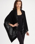 Fine gauge knit with hand beaded sequin border.One size fits most About 56 X 72 70% acrylic/30% wool Dry clean Imported 