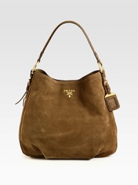 Classic suede hobo design with front goldtone logo.Shoulder strap, 7½ dropMagnetic snap closureProtective metal feetOne inside zip pocketThree inside open pocketsSignature jacquard lining15½W X 13½H X 4¼DMade in Italy Classic suede hobo design with front goldtone logo.Shoulder strap, 7½ dropMagnetic snap closureProtective metal feetOne inside zip pocketThree inside open pocketsSignature jacquard lining15½W X 13½H X 4¼DMade in Italy