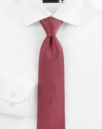 A savvy, sophisticated look woven in Italian silk, with a geometric pattern detail.SilkDry cleanMade in Italy