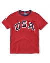 This sporty tee celebrates Team USA's participation in the 2012 Olympics sporty tee with USA Olympic Team screenprinted on soft, breathable cotton.