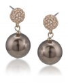 Twice as nice. Carolee's elegant double drop earrings feature luminous glass pearls and sparkling post details. Crafted in gold tone mixed metal, they're suitably stylish for daytime or evening. Approximate drop: 1 inch.
