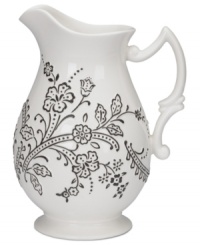 Oleg Cassini weaves a table of playful sophistication with the Ava pitcher, featuring lacy flowers and dots embossed and hand painted in black and white. Oleg Cassini weaves a table of playful sophistication with the Ava pitcher, featuring lacy flowers and dots embossed and hand painted in black and white.
