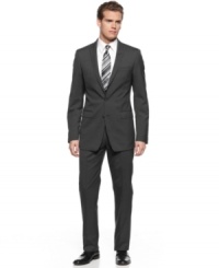 With a sleek slim fit, this pinstriped Calvin Klein suit takes your dress collection into modern territory. With a sleek slim fit, this pinstriped Calvin Klein suit takes your dress collection into modern territory.