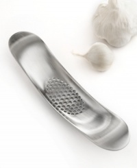 Ready to rock? Cut mess and hassle out of the kitchen with this innovative stainless steel garlic crusher, which keeps the smell of what you're preparing off of your hands. Simply apply pressure and a rocking motion to crush and dice cloves to perfection. Ready to rock? Cut mess and hassle out of the kitchen with this innovative stainless steel garlic crusher, which keeps the smell of what you're preparing off of your hands. Simply apply pressure and a rocking motion to crush and dice cloves to perfection.
