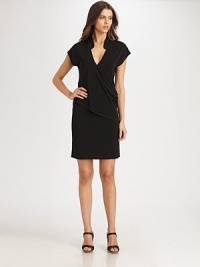 The LBD re-imagined, this jersey design features a classic mandarin collar leading to a seductive v-neckline and a fashion-forward draped, asymmetrical front. V-necklineShort sleevesDraped, asymmetrical bodice detailAbout 39 from shoulder to hem70% rayon/24% polyester/6% spandexDry cleanImported Model shown is 5'11½ (181cm) wearing US size Small. The LBD re-imagined, this jersey design features a classic mandarin collar leading to a seductive v-neckline and a fashion-forward draped, asymmetrical front. V-necklineShort sleevesDraped, asymmetrical bodice detailAbout 39 from shoulder to hem70% rayon/24% polyester/6% spandexDry cleanImported Model shown is 5'11½ (181cm) wearing US size Small.