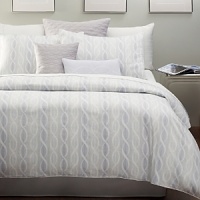 Like a festooned curtain that unfolds to soft sheets of shimmering motifs, Curtain Call sets the stage for the bed of your dreams with its multi-tones of fresh blue and white. Embroidered and quilted pillows are the supporting cast for this melodic ensemble. Like a festooned curtain that unfolds to soft sheets of shimmering motifs, Curtain Call sets the stage for the bed of your dreams with its multi-tones of fresh blue and white. Embroidered and quilted pillows are the supporting cast for this melodic ensemble.