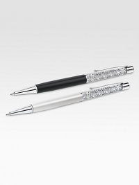 A sophisticated gift for the woman who weighs her words and wants to present them with sparkle, these precision writing instruments are filled with tiny Swarovski crystals for years of shimmer.Two white pearl ballpoint pensApprox. 5.5LMade in Austria A sophisticated gift for the woman who weighs her words and wants to present them with sparkle, these precision writing instruments are filled with tiny Swarovski crystals for years of shimmer.Two white pearl ballpoint pensApprox. 5.5LMade in Austria