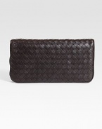 Luxurious nappa lambskin with iconic woven detail.Snap closure One outside open pocket One inside zip pocket Six pull-out credit card slots Nappa lambskin lining 8W X 4H X 1D Made in Italy
