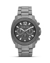 Give the boys a run for their money with this matte gunmetal watch from MICHAEL Michael Kors. It's sporty look and boldly sized case is the prefect foil to ultra feminine looks.