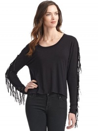 THE LOOKScoop necklinePullover styleLong sleeves with grommet and fringe detailsTHE FITAbout 22 from shoulder to hemTHE MATERIALShirt: 92% viscose/8% spandexFringe: LeatherCARE & ORIGINDry cleanImported THE LOOKScoop necklinePullover styleLong sleeves with grommet and fringe detailsTHE FITAbout 22 from shoulder to hemTHE MATERIALShirt: 92% viscose/8% spandexFringe: LeatherCARE & ORIGINDry cleanImported