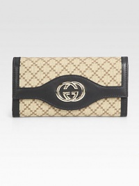 Signature logo jacquard in a foldover silhouette, finished with leather trim and GG hardware.Magnetic snap flap pocketCenter zip pocketTwo inner compartmentsThirteen credit card slotsFully lined7½W X 4H X 1¼DMade in Italy