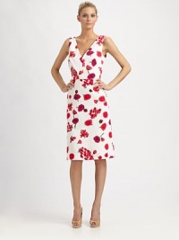 Pretty florals pop on this lady-like cotton sheath.V necklineSleevelessBodice dartsHigh waistBack VCenter back zipperAbout 25 from natural waistCottonDry cleanMade in USA of Italian fabricModel shown is 5'9 (175cm) wearing US size 4. Pretty florals pop on this lady-like cotton sheath.V necklineSleevelessBodice dartsHigh waistBack VCenter back zipperAbout 25 from natural waistCottonDry cleanMade in USA of Italian fabricModel shown is 5'9 (175cm) wearing US size 4.