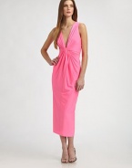 This colorful stretch jersey style is finished with a flattering, sexy twist-front detail.Plunging necklineSleevelessTwist-front detailSlight racerbackVertical back seamFully linedAbout 33 from natural waist95% polyester/5% spandexDry cleanMade in USA of imported fabricModel shown is 5'10 (177cm) wearing US size 4. 